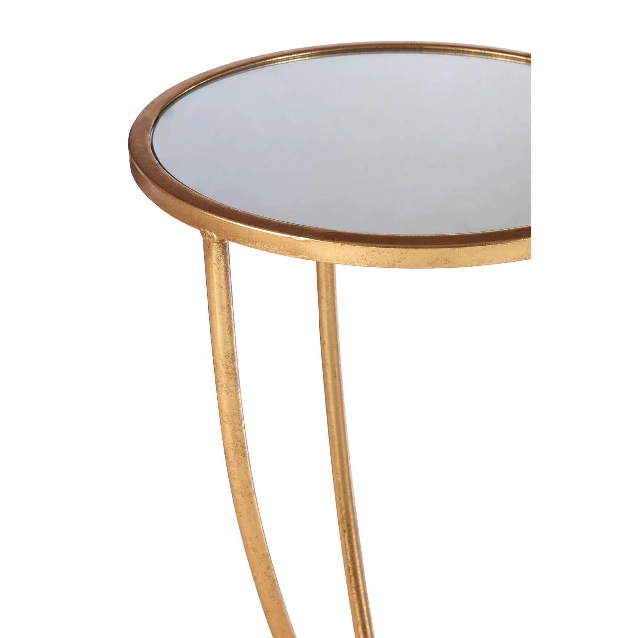 Gold metal round side table with mirrored glass top, close-up of frame and surface