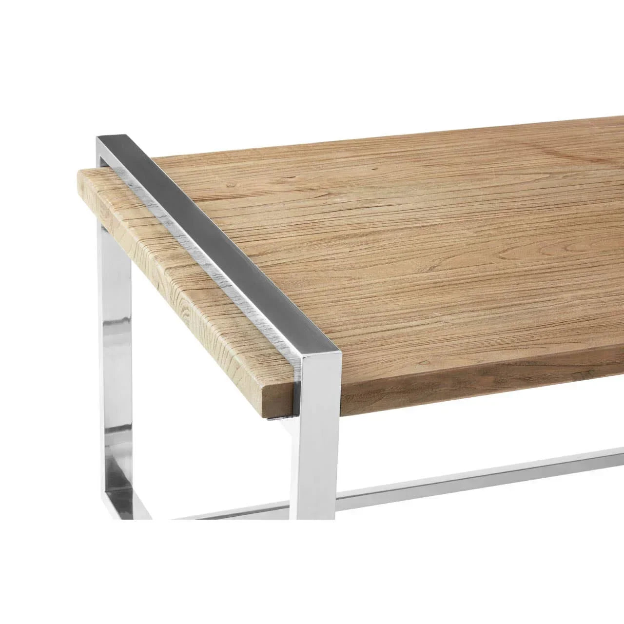 Rectangular wooden dining table with chrome metal legs, close-up of tabletop corner
