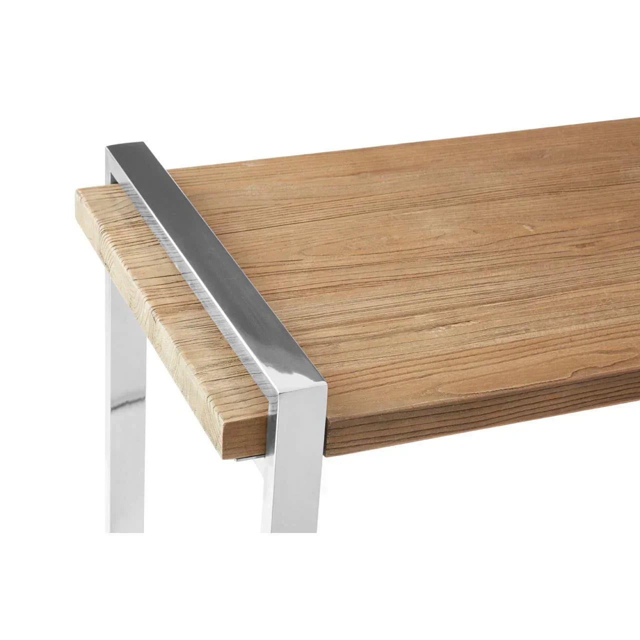 Close view of wooden dining table top with chrome metal leg detail