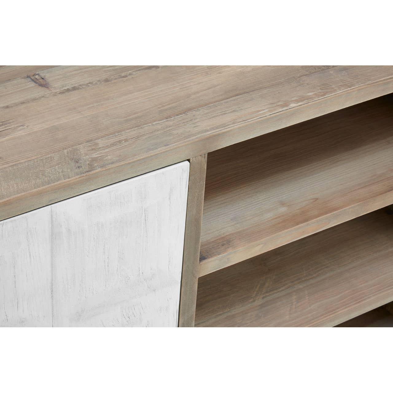 Close up of wooden sideboard with white panel door and open shelving