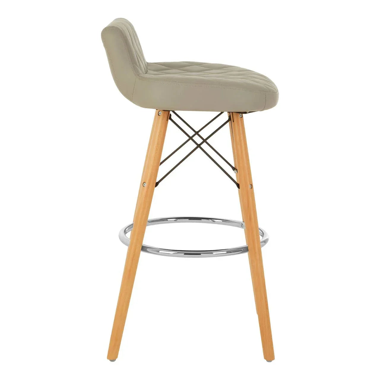 Beige bar stool with quilted seat, wooden legs and chrome footrest, side view