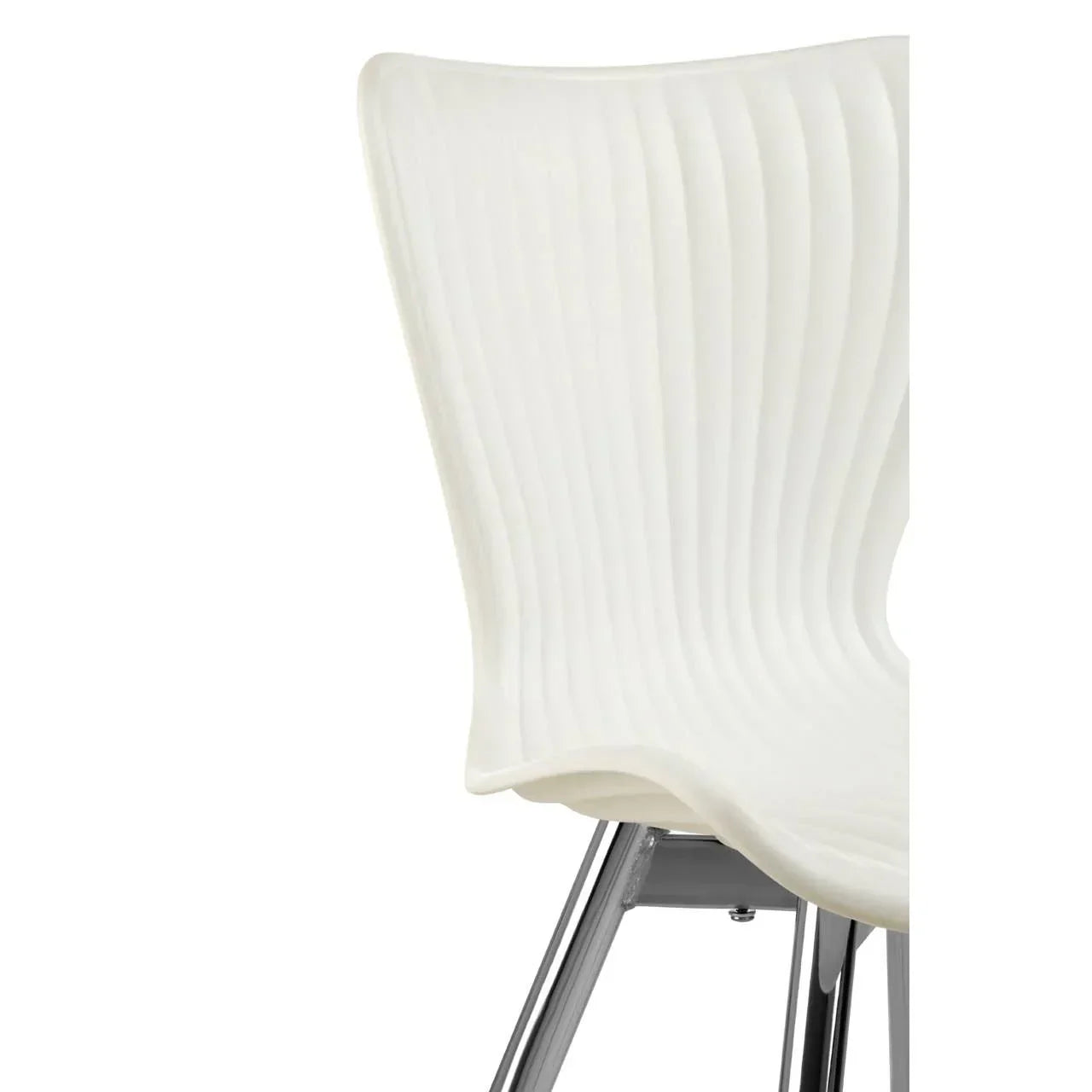 White dining chair with ribbed backrest and chrome legs, close-up side view