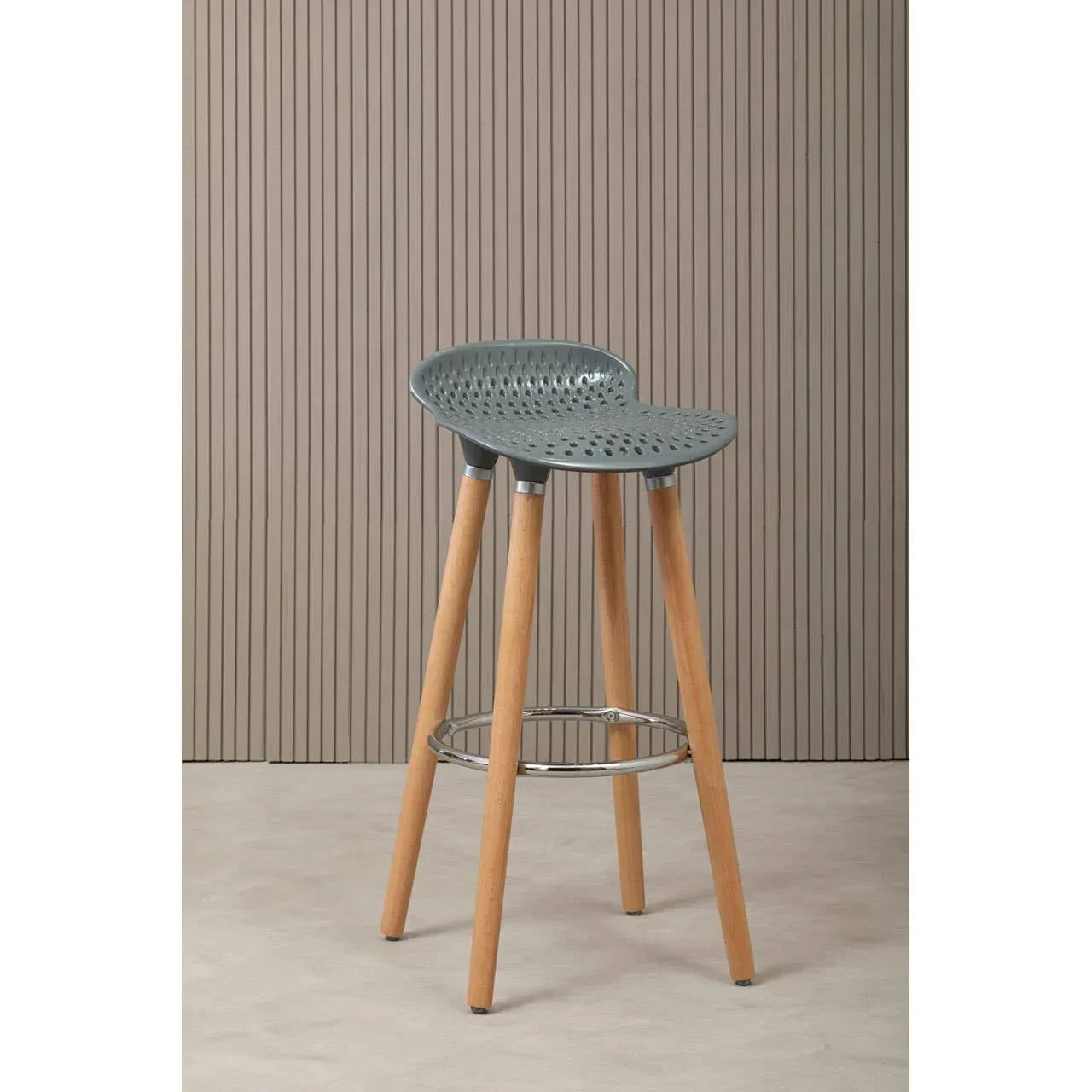 Modern bar stool with grey perforated seat, wooden legs and metal footrest