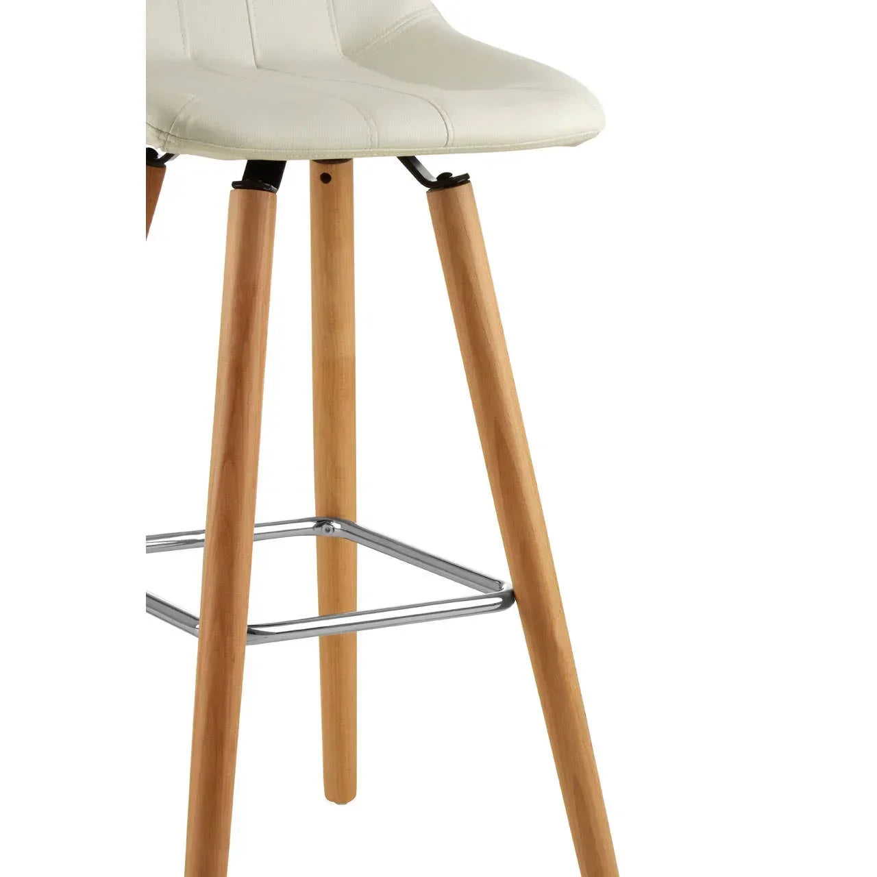 Cream bar stool with wooden legs and chrome footrest close-up