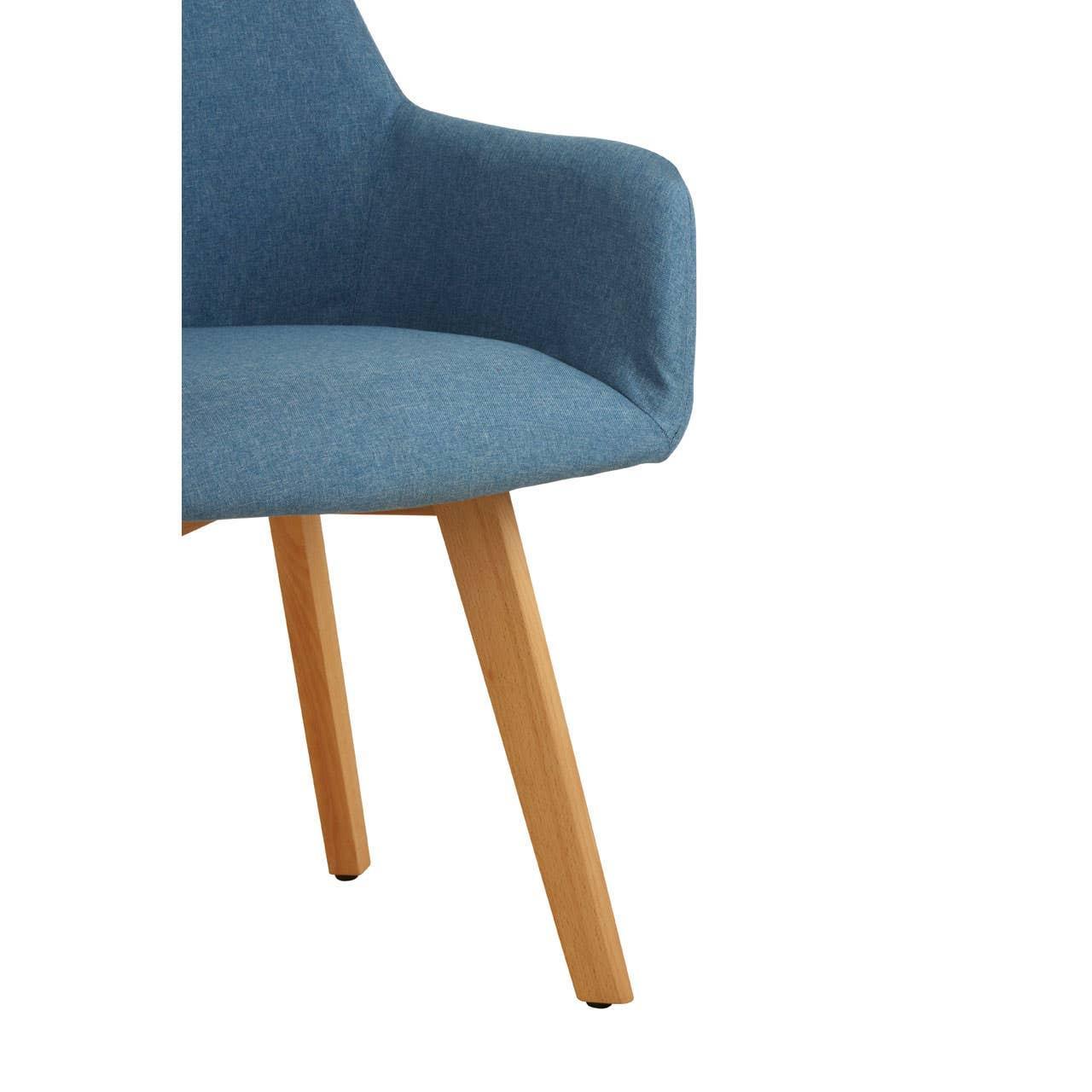 Blue fabric dining chair with wooden legs and curved armrest, partial side view