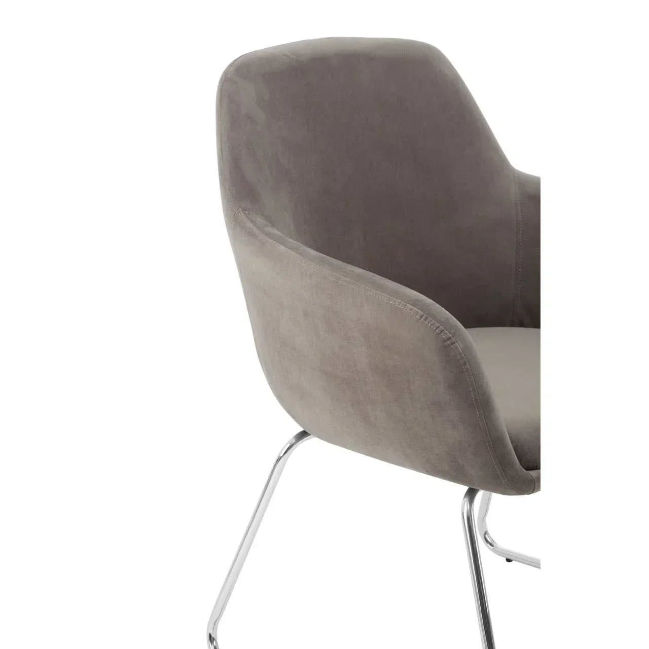 Grey velvet accent chair with curved back and chrome legs, side angle view