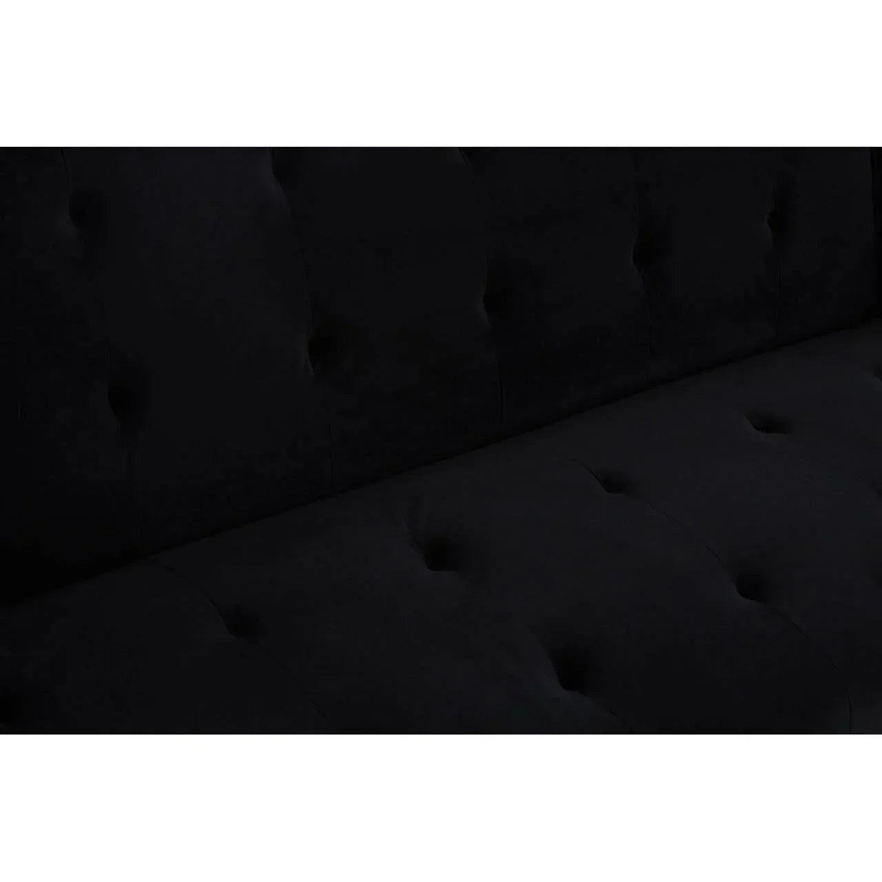Close-up of black fabric sofa upholstery with button tufted detail