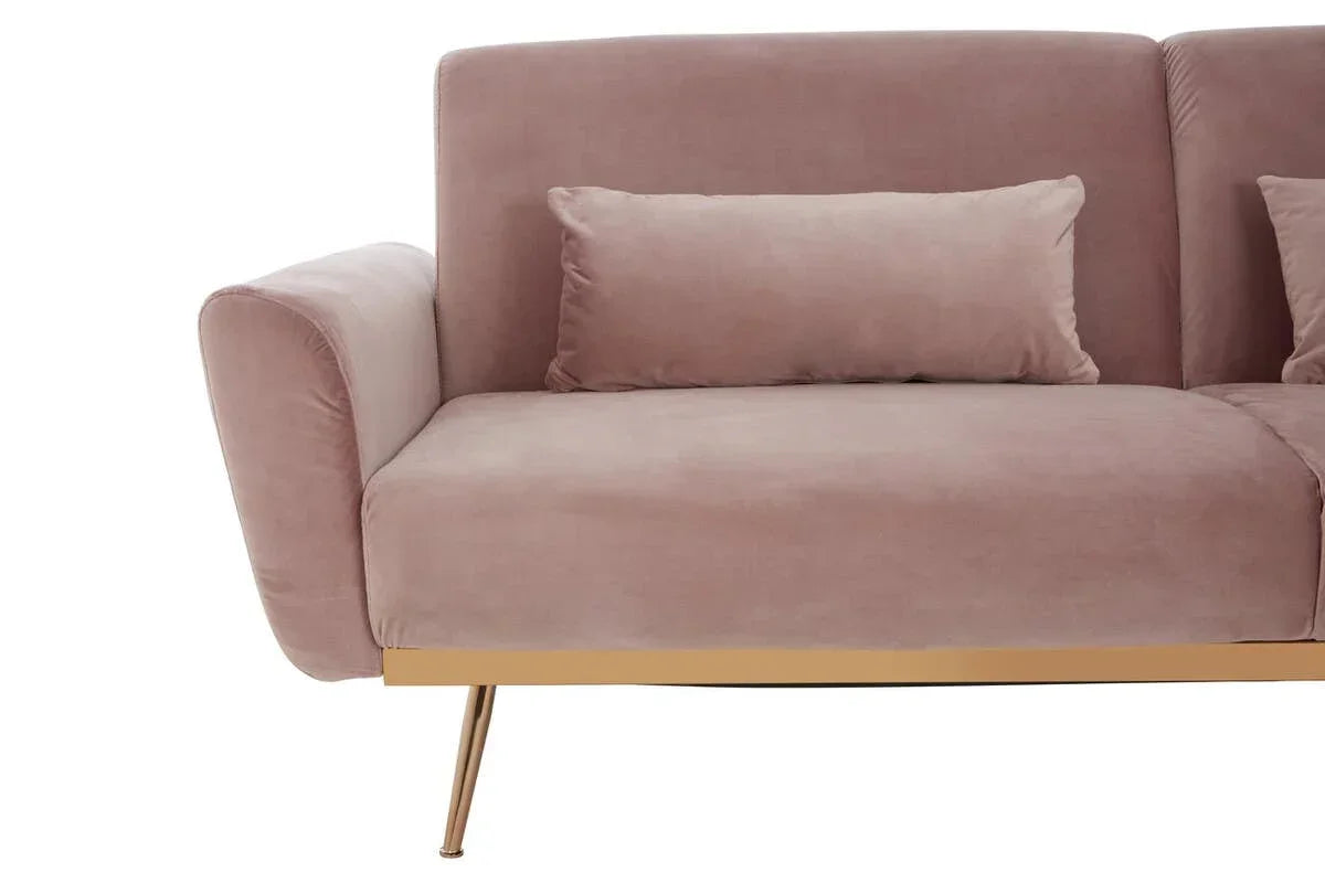 Blush pink velvet sofa with gold metal leg and armrest, featuring matching cushion