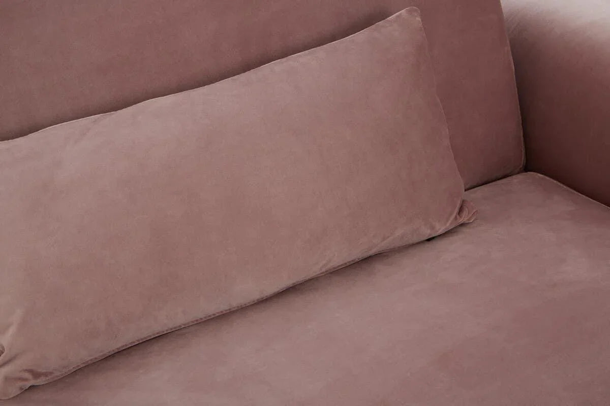 Close up of mauve velvet sofa cushion and seat upholstery