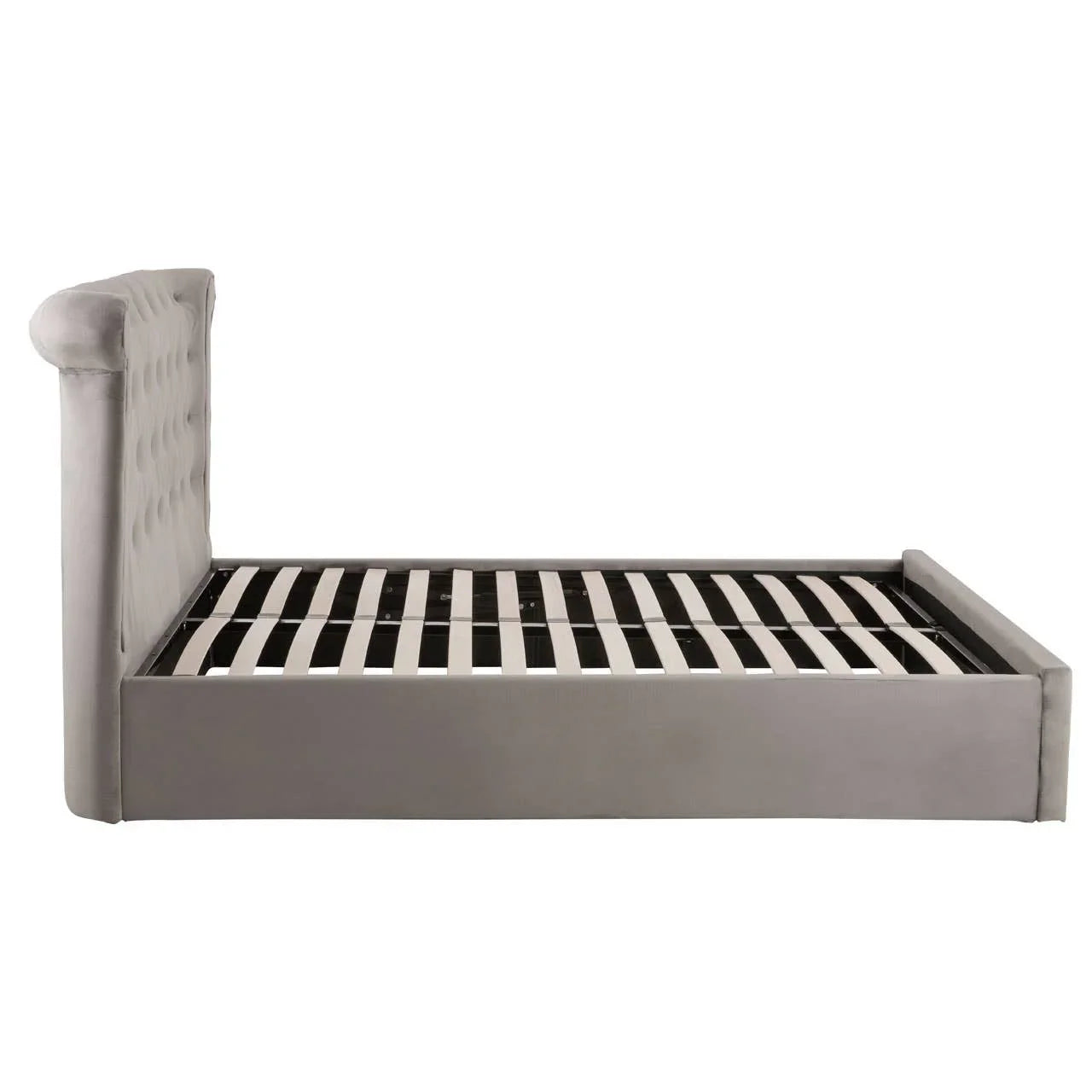 Grey upholstered bed frame with tufted headboard and wooden slats, side angle view