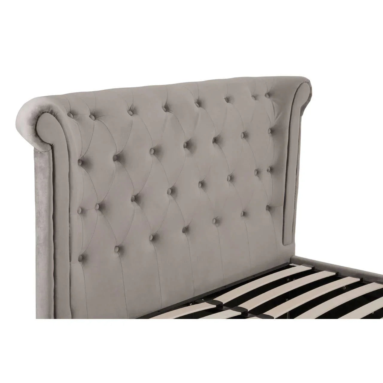 Grey upholstered bed frame with tufted wingback headboard and wooden slats
