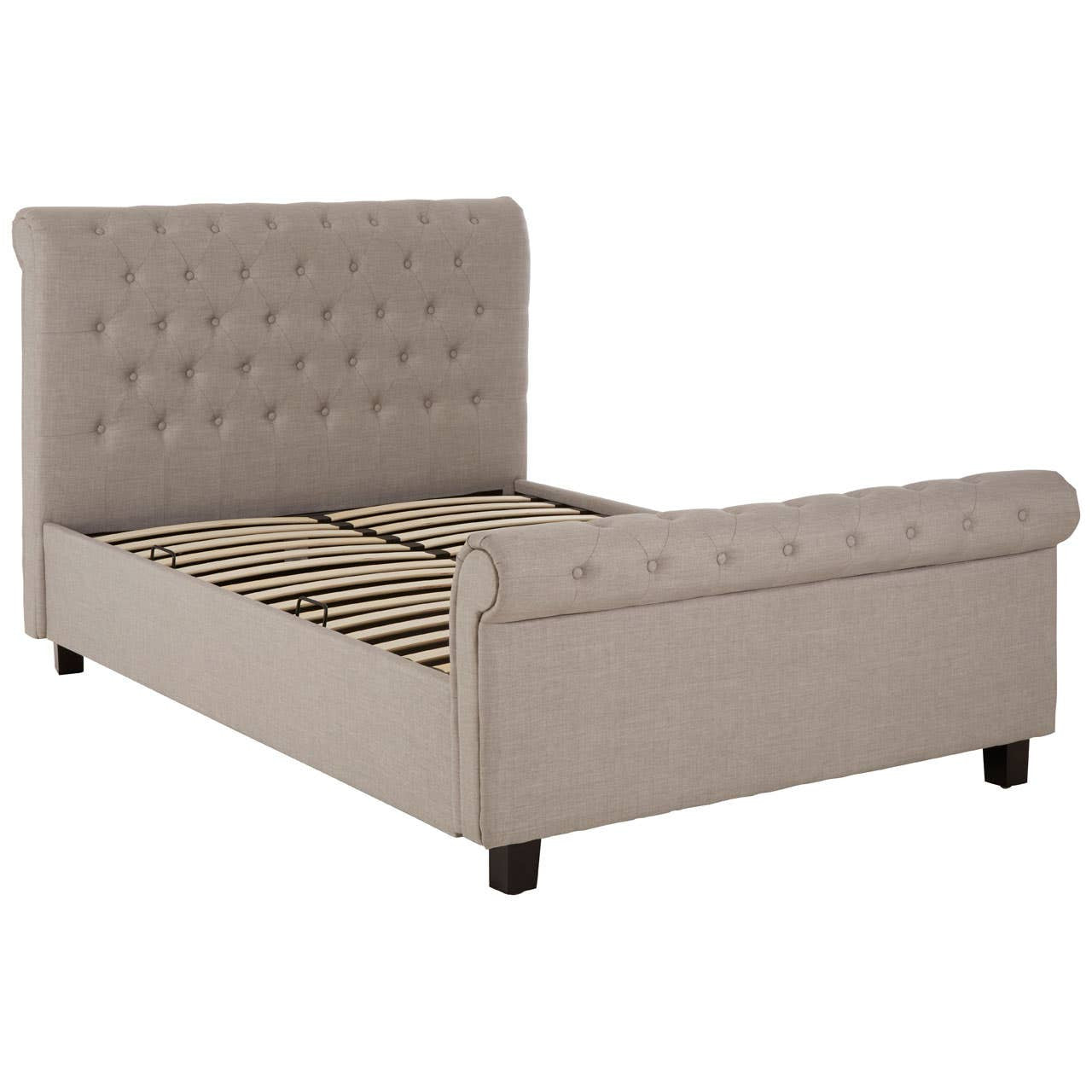 Light grey upholstered double bed with a tufted headboard, wooden slats visible inside the frame, and rounded edges. The bed stands on four black legs, showcasing a modern and elegant design suitable for various bedroom styles