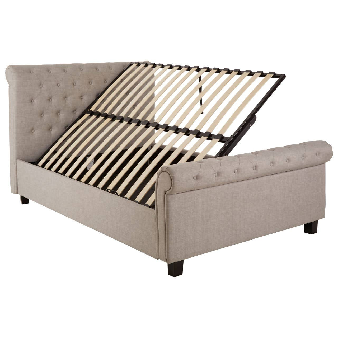 Light grey ottoman double bed with a tufted headboard, featuring a slatted base that is partially lifted to reveal storage space underneath. The bed has rounded edges and sits on small black legs