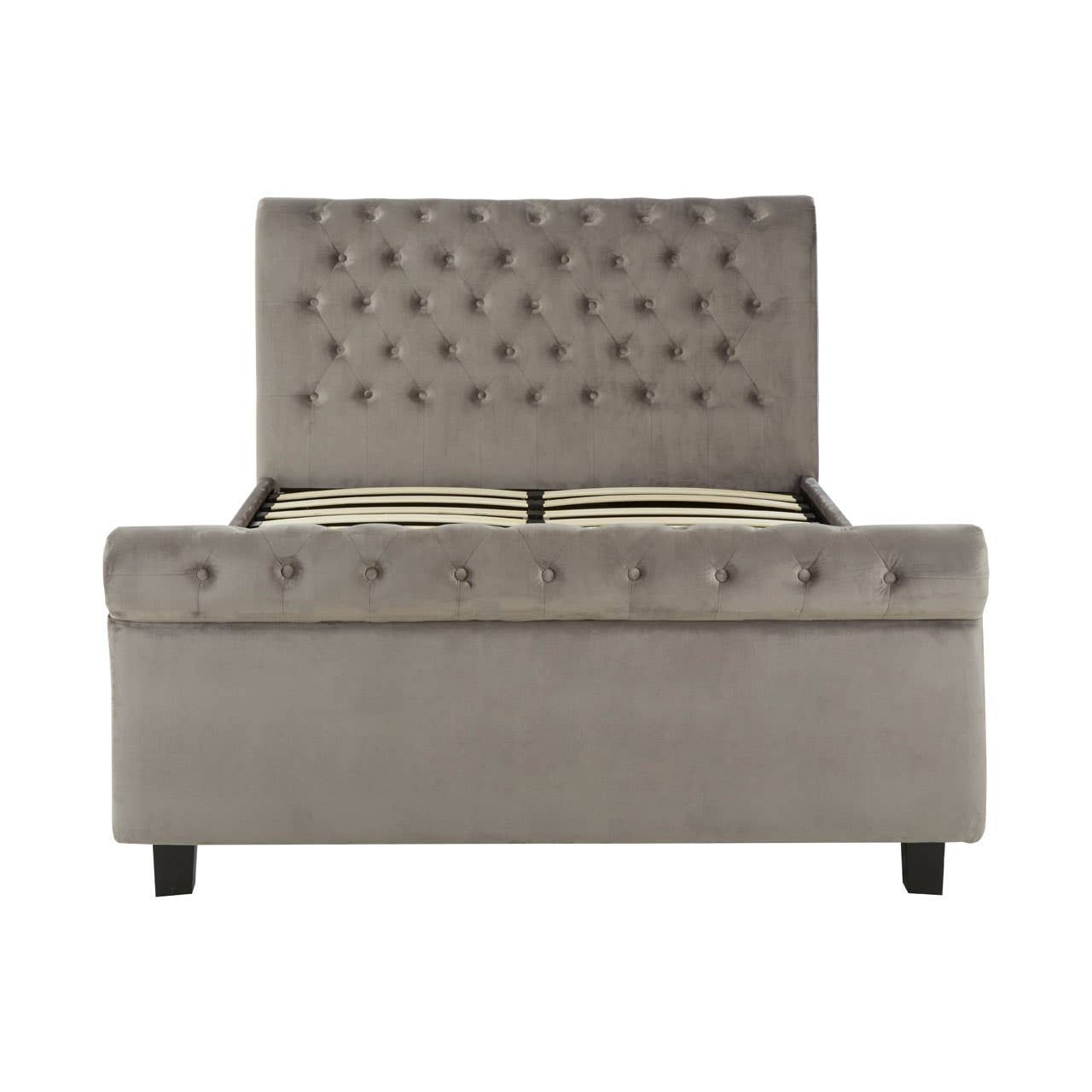Grey upholstered king bed with a tufted headboard, featuring a storage ottoman base and sleek black legs. The design is modern and elegant, suitable for various bedroom styles