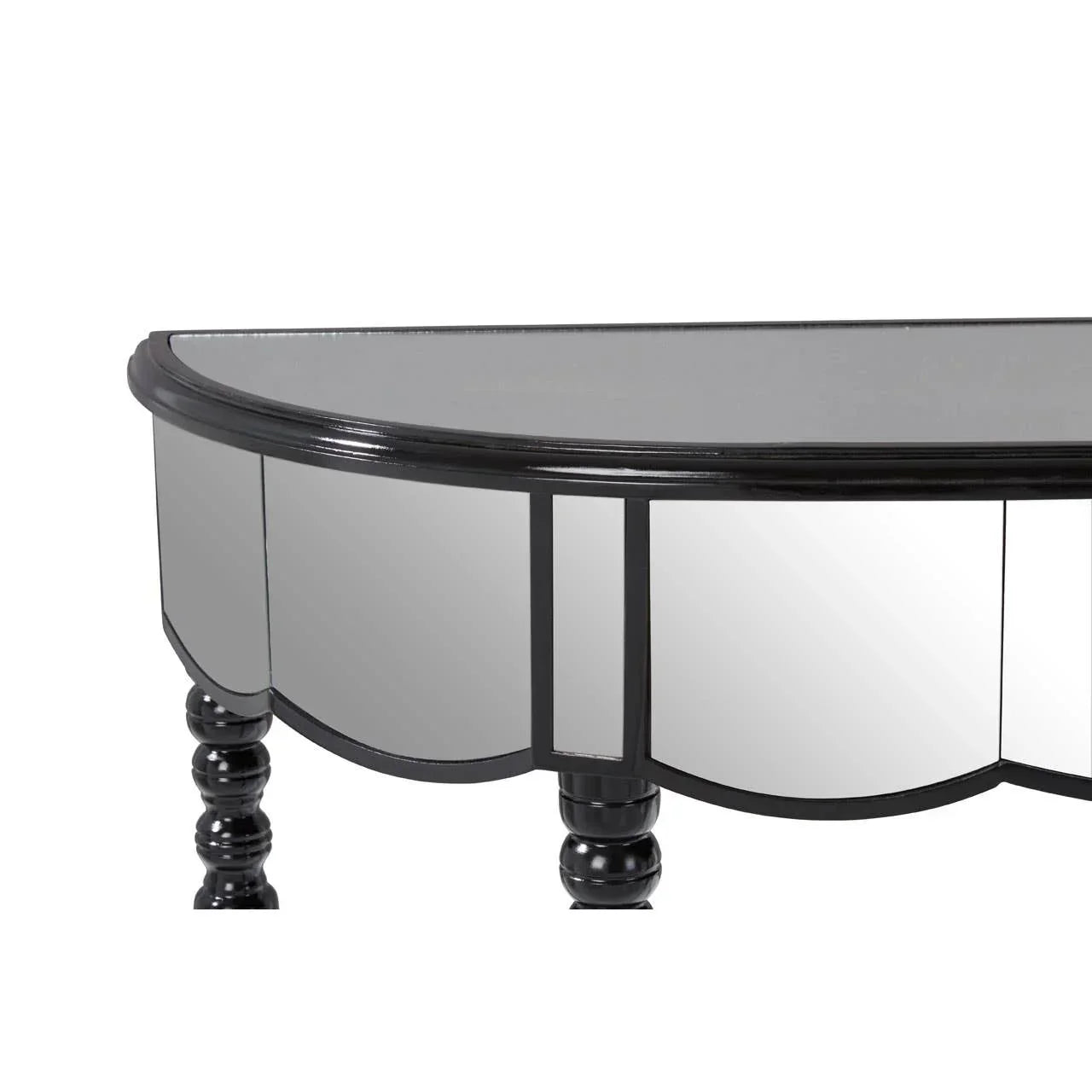 Half-round mirrored console table with black wooden legs and scalloped detailing