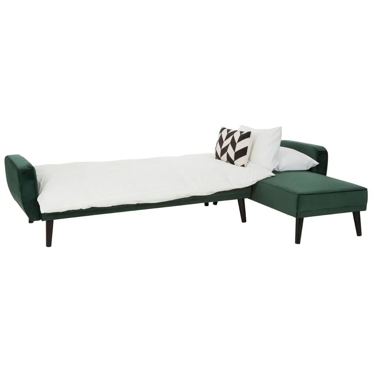 Green velvet corner sofa bed with white bedding and patterned cushion