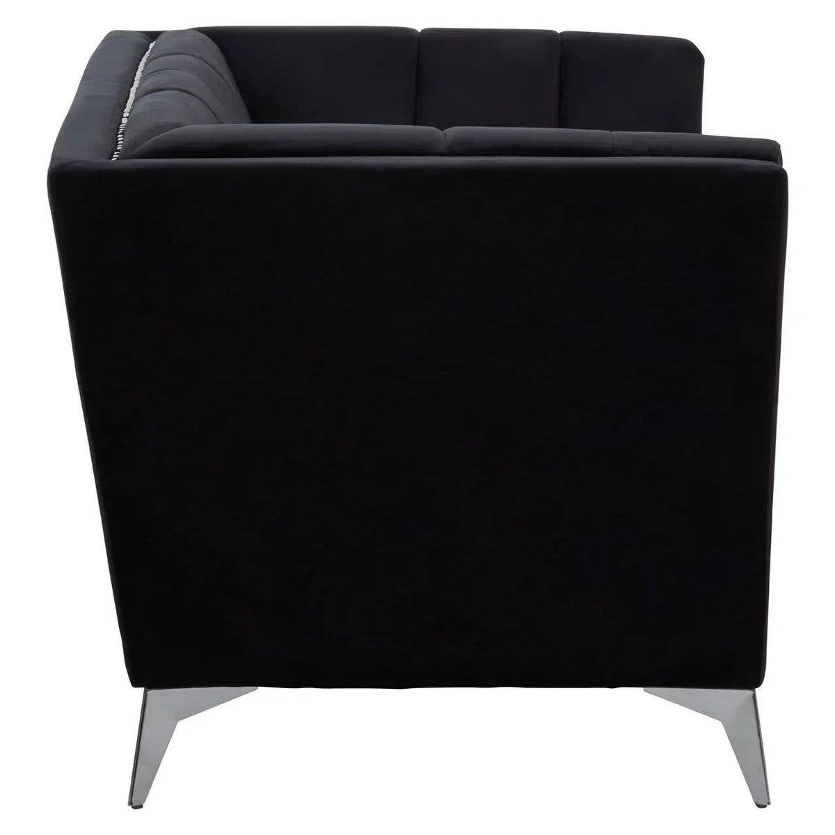 Rear view of black velvet sofa with metal legs and tufted backrest