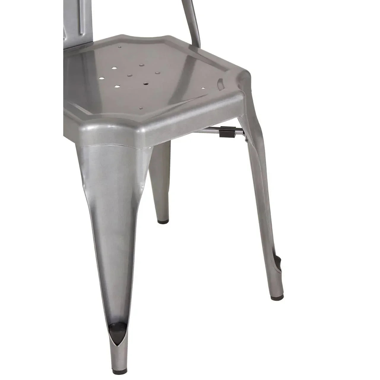 Silver metal dining chair with perforated seat and sturdy angled legs