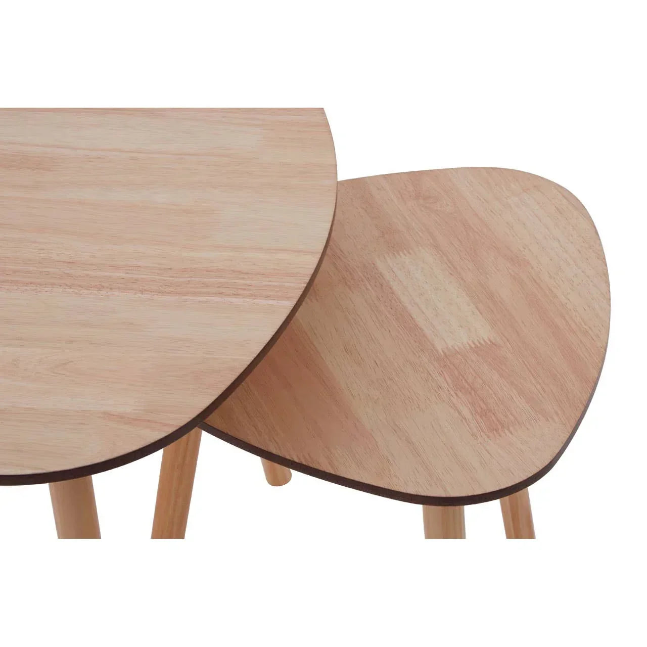 light wood nesting tables with rounded tops and angled legs closeup