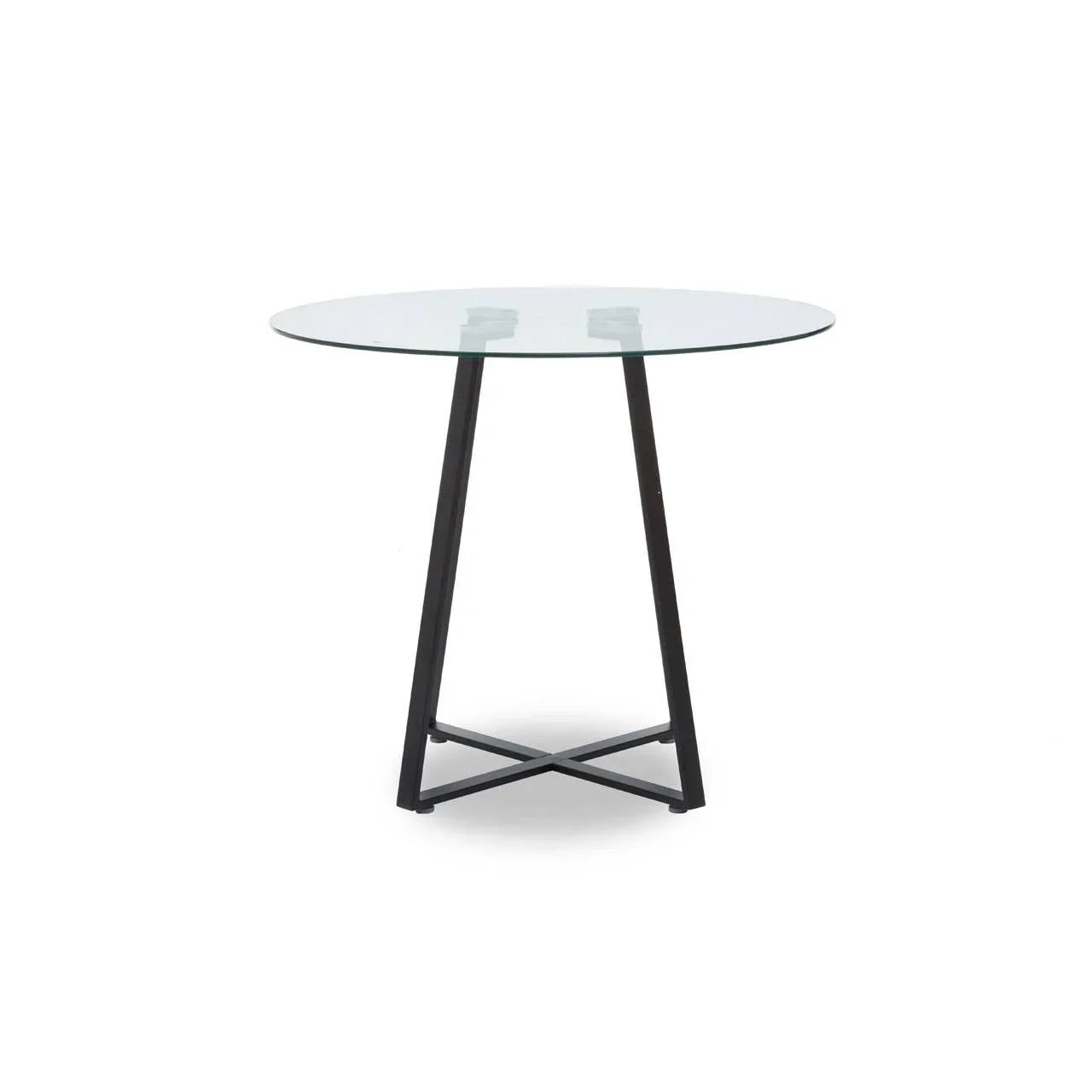 Round glass dining table with black metal legs and cross base on white background