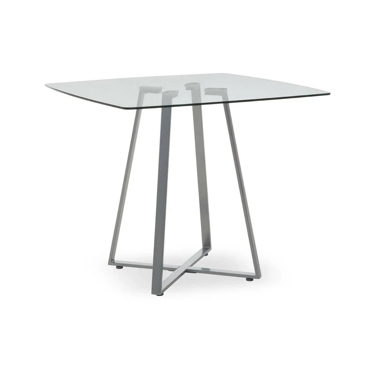 Square glass top dining table with silver metal legs on white background