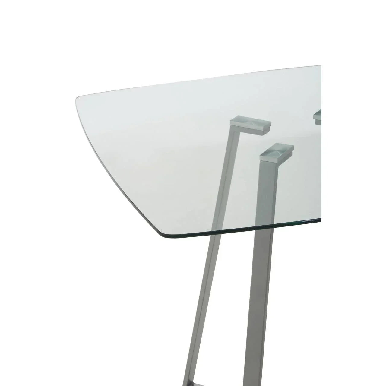 Clear glass dining table with metal legs and curved edge, close-up view