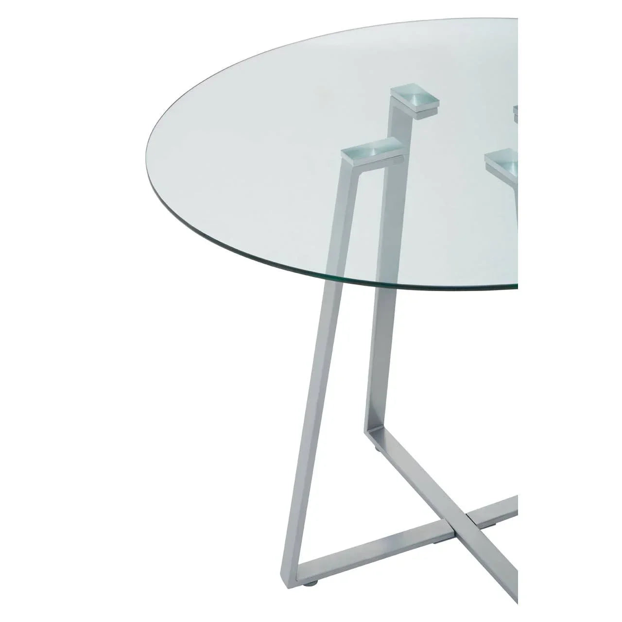 Round glass dining table with metal legs, close-up view of top and modern frame