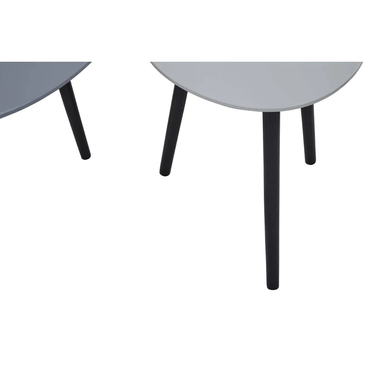 Round side table with grey top and black angled legs, partial close-up view