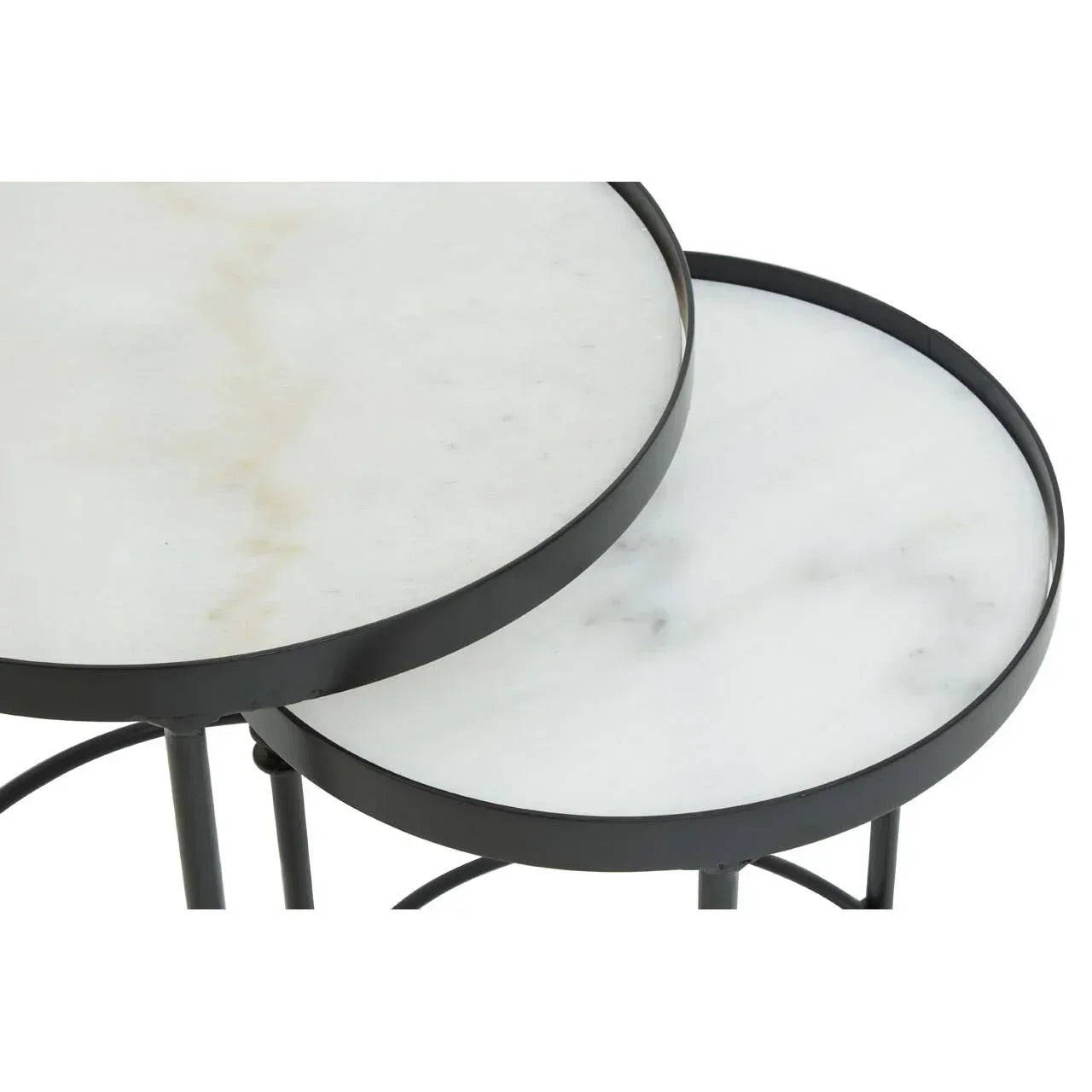 White marble nesting tables with black metal frames, close-up on round tabletops