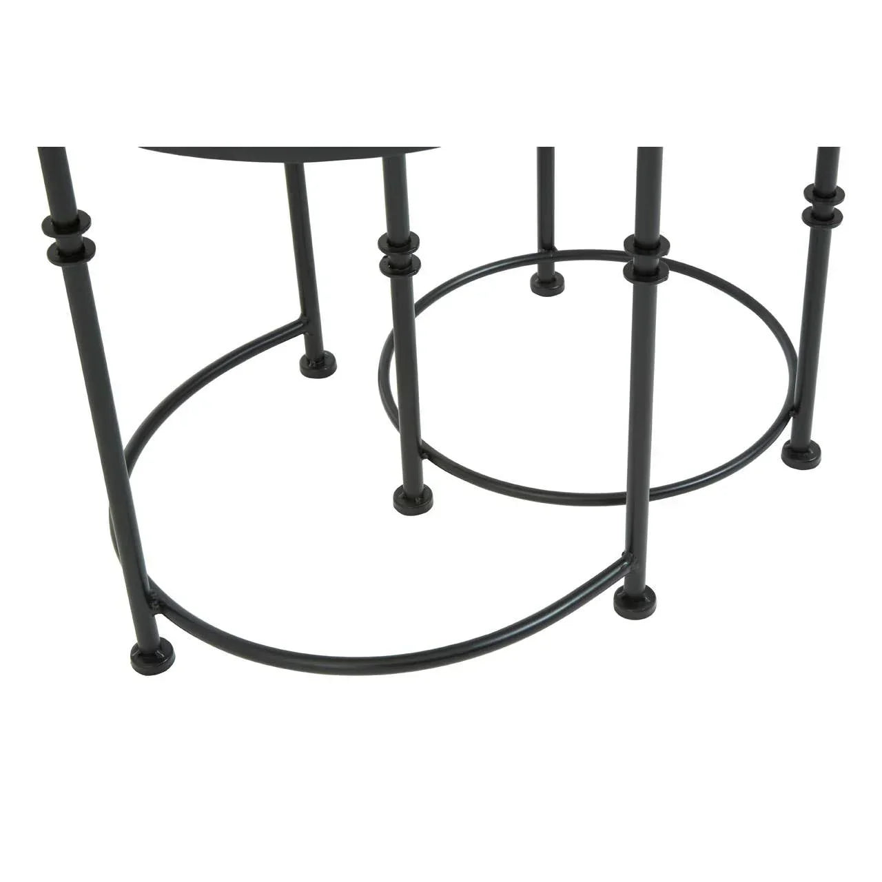 Black metal coffee table legs with round base detail on white background