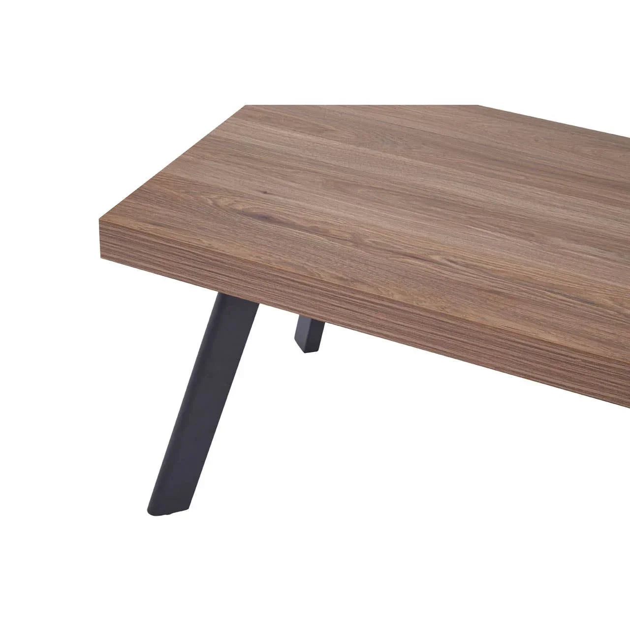 Rectangular wooden dining table with black angled metal legs, close-up of tabletop corner