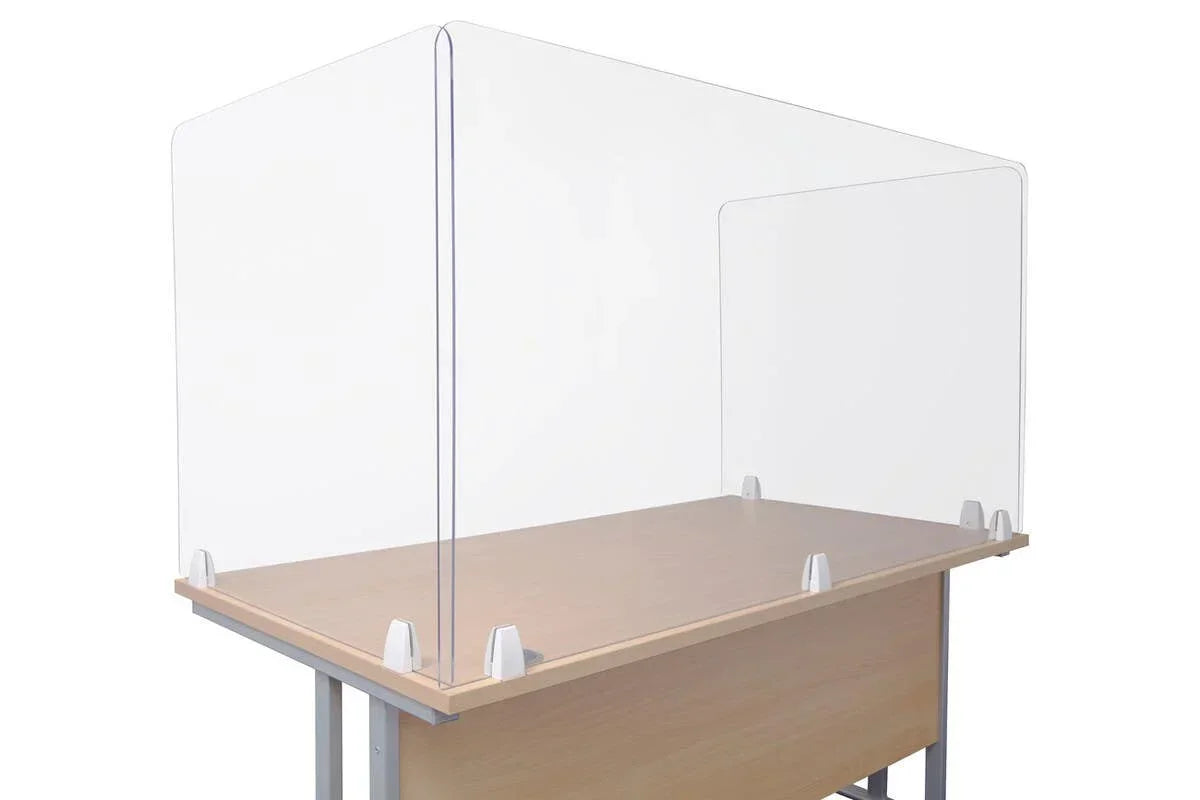 Clear acrylic desk screen with rounded corners on a wooden tabletop workspace