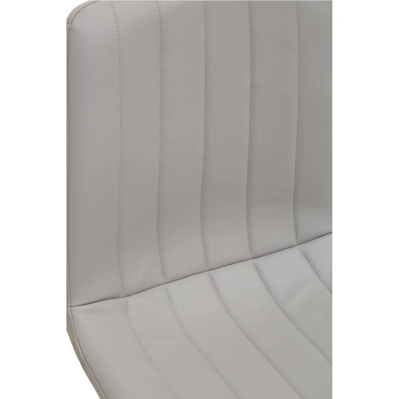 Close-up of grey faux leather dining chair with vertical stitching detail