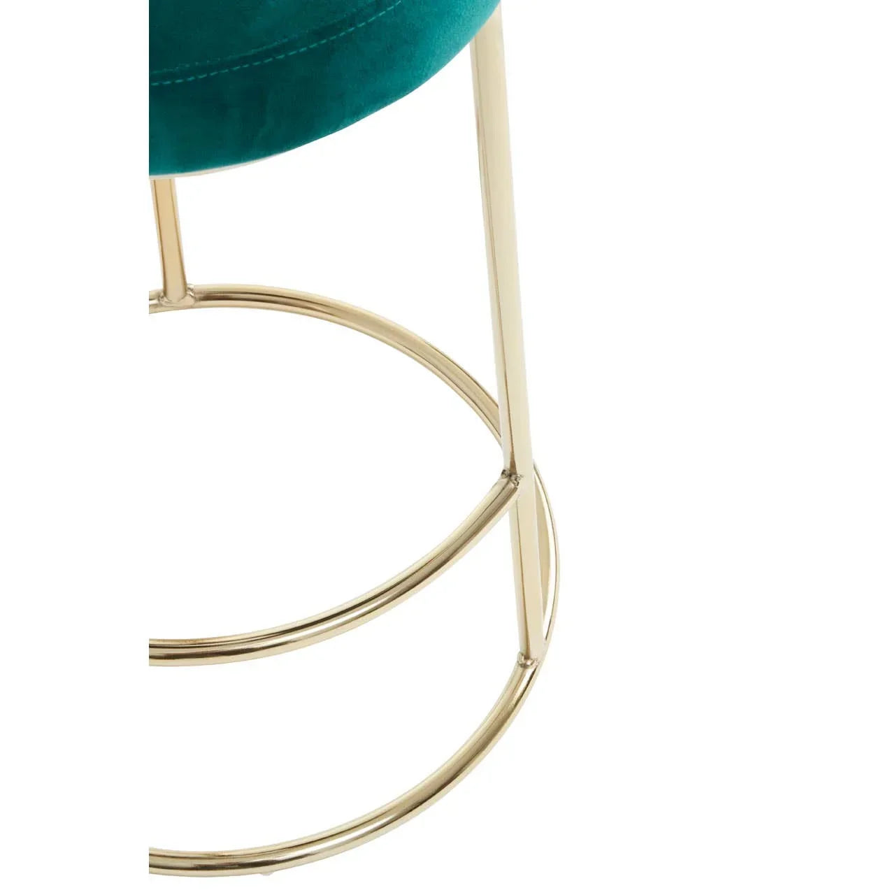 Gold metal bar stool base with teal velvet seat, close-up on legs and footrest