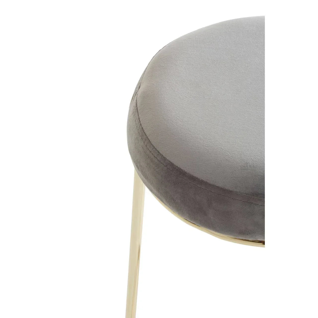 Grey velvet stool seat with gold metal legs, close-up of upholstery detail