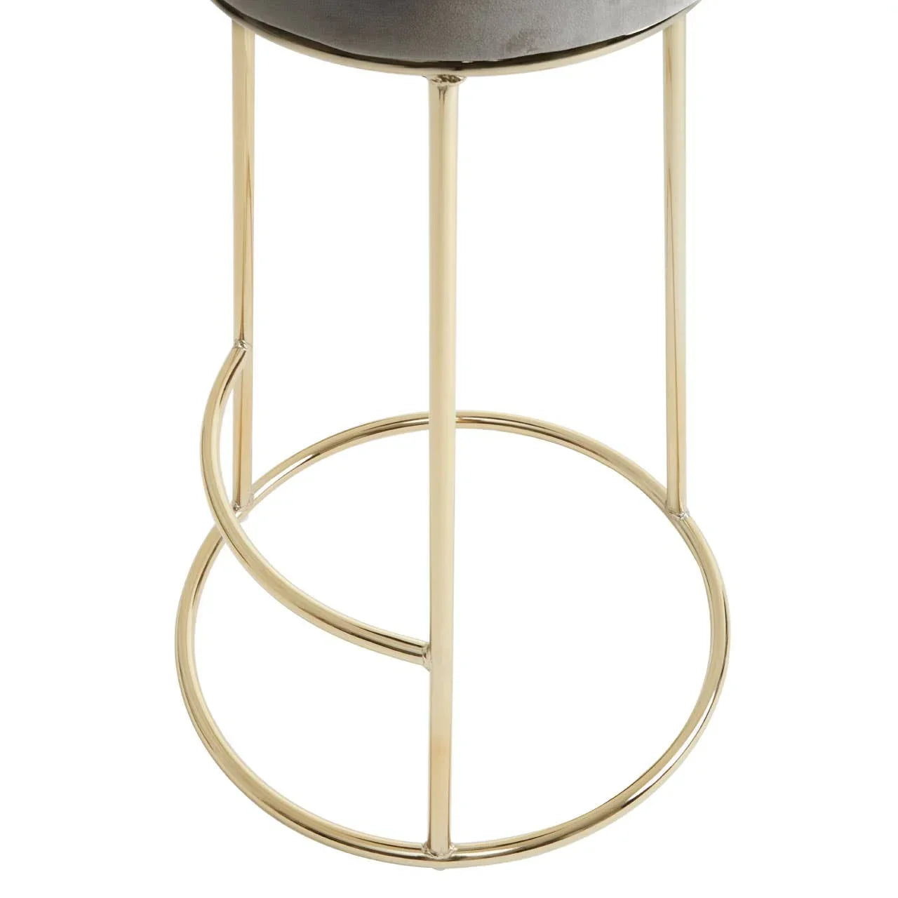 Gold metal bar stool frame with circular footrest and grey velvet seat close-up