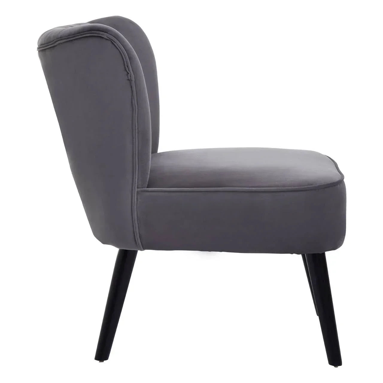 Side view of grey velvet accent chair with black wooden legs