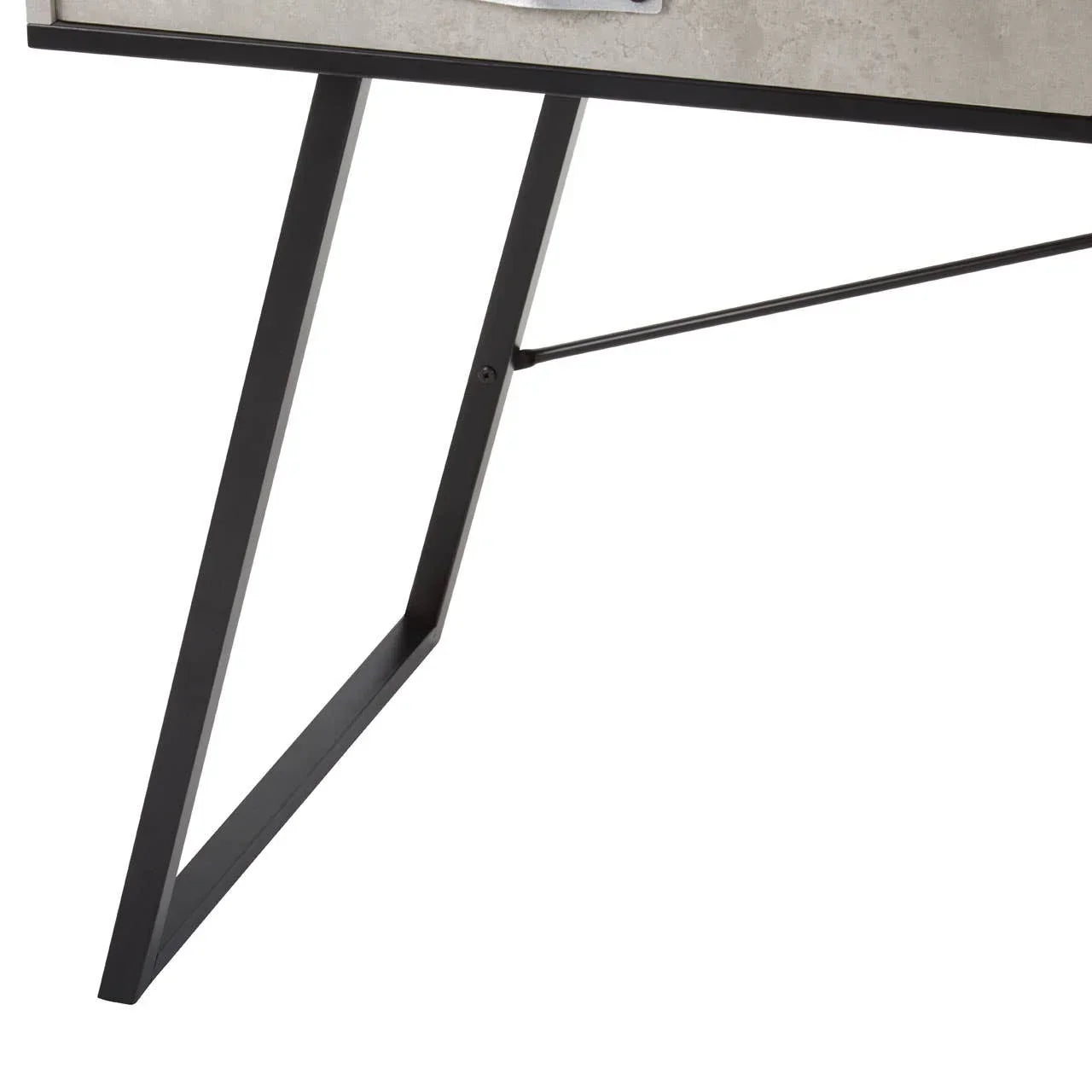 Close view of black metal desk leg with concrete finish tabletop
