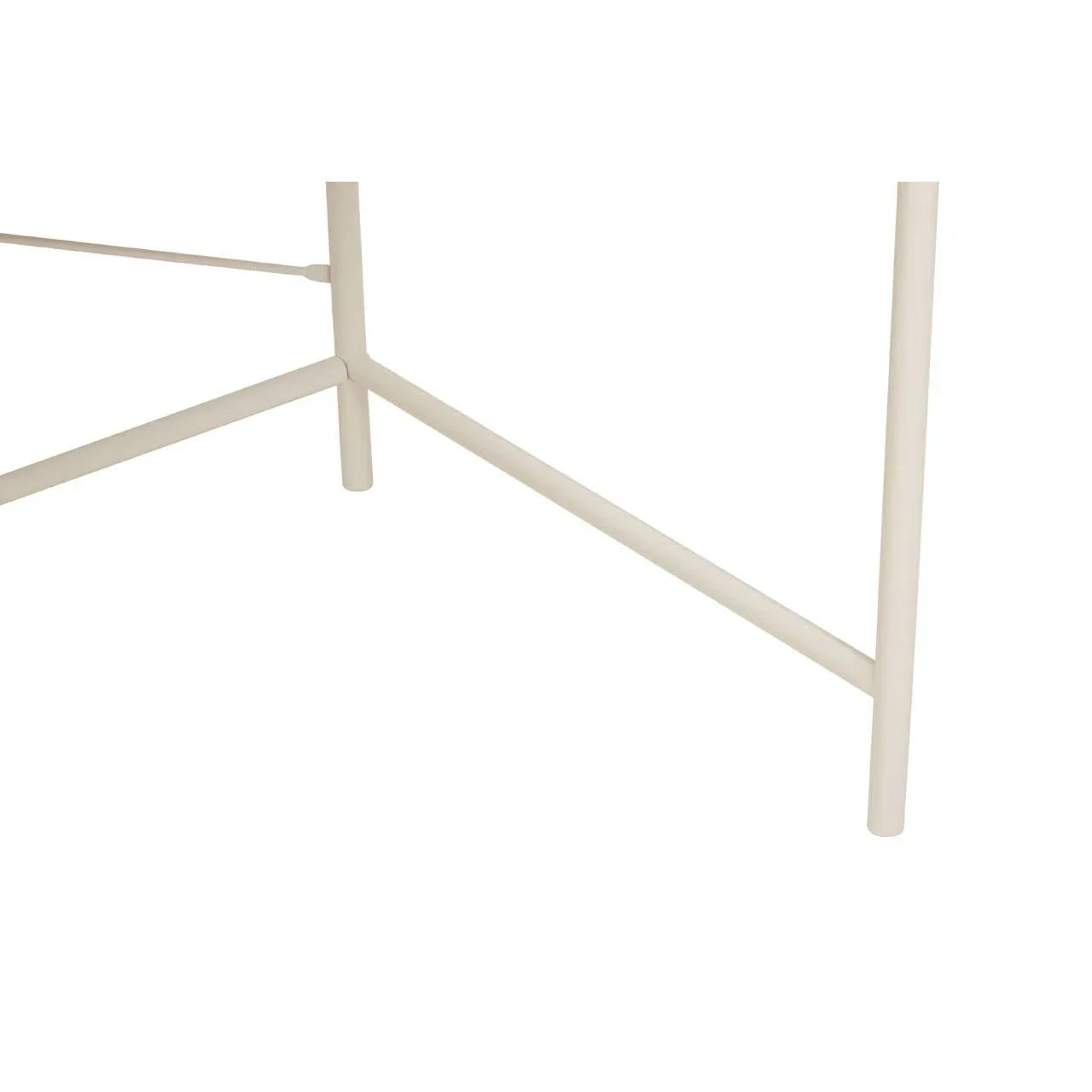 Cream metal table legs with crossbar support, close-up of dining furniture base