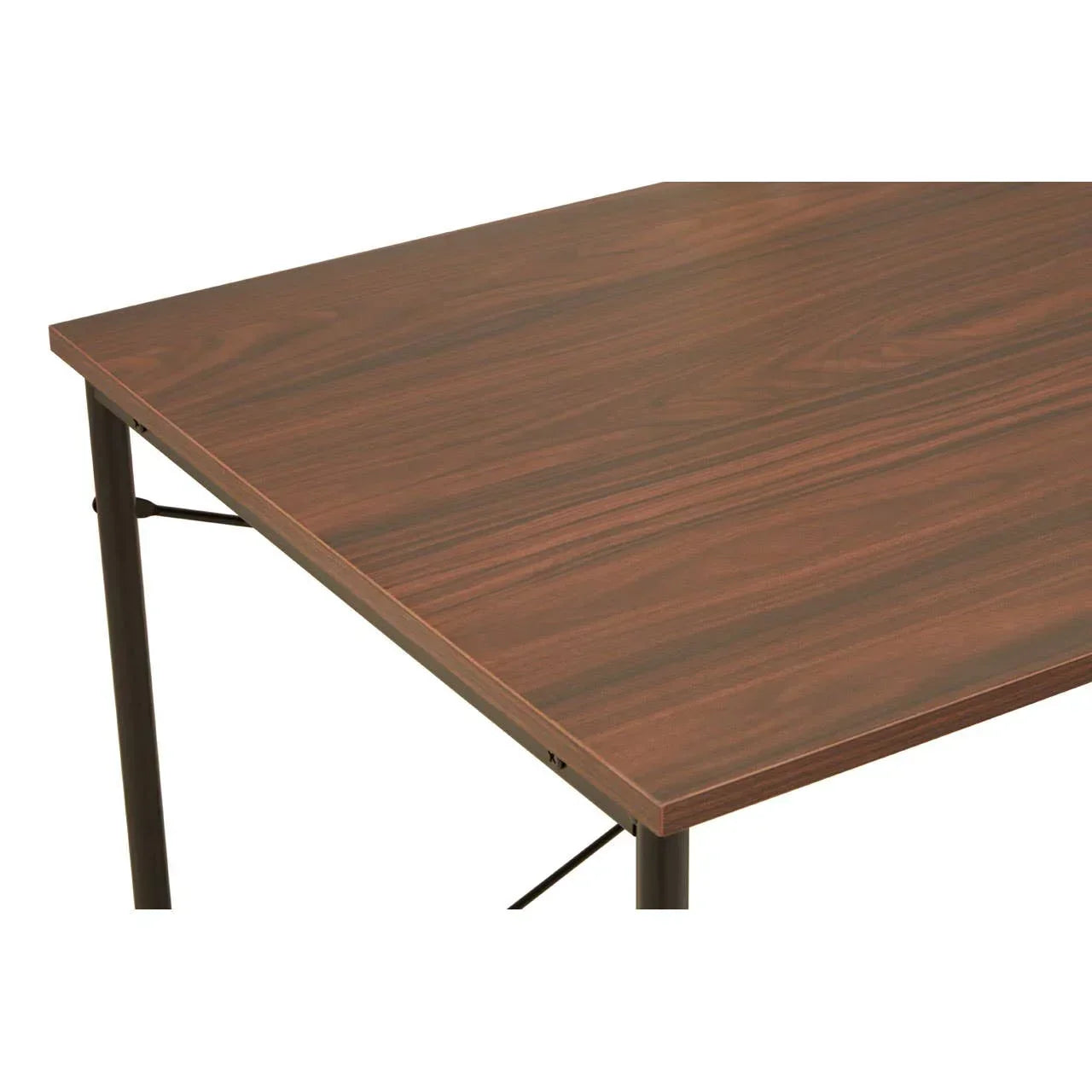 Rectangular wood effect dining table with black metal legs, close-up of tabletop corner