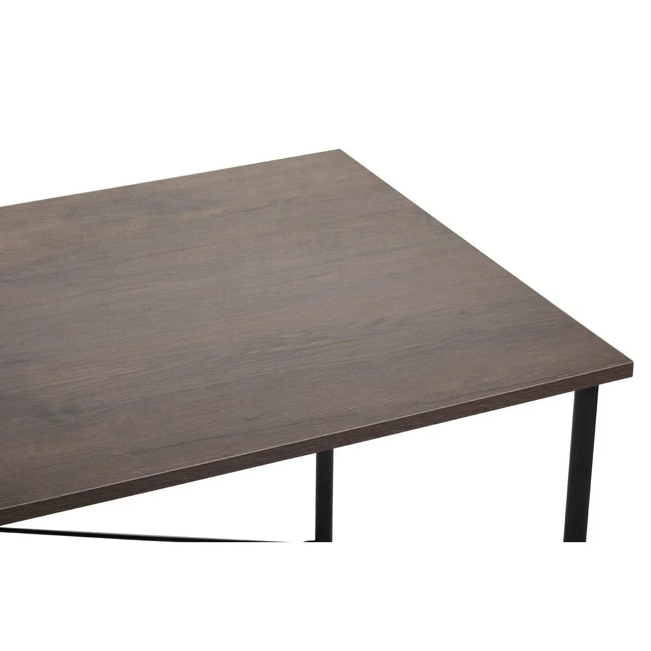 Dark wood dining table corner with slim black metal legs