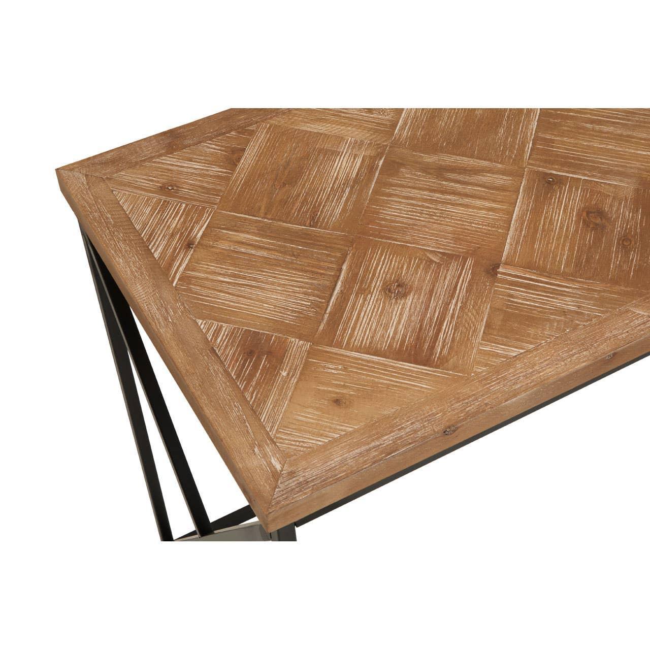 Corner view of wooden coffee table top with parquet pattern and black metal legs