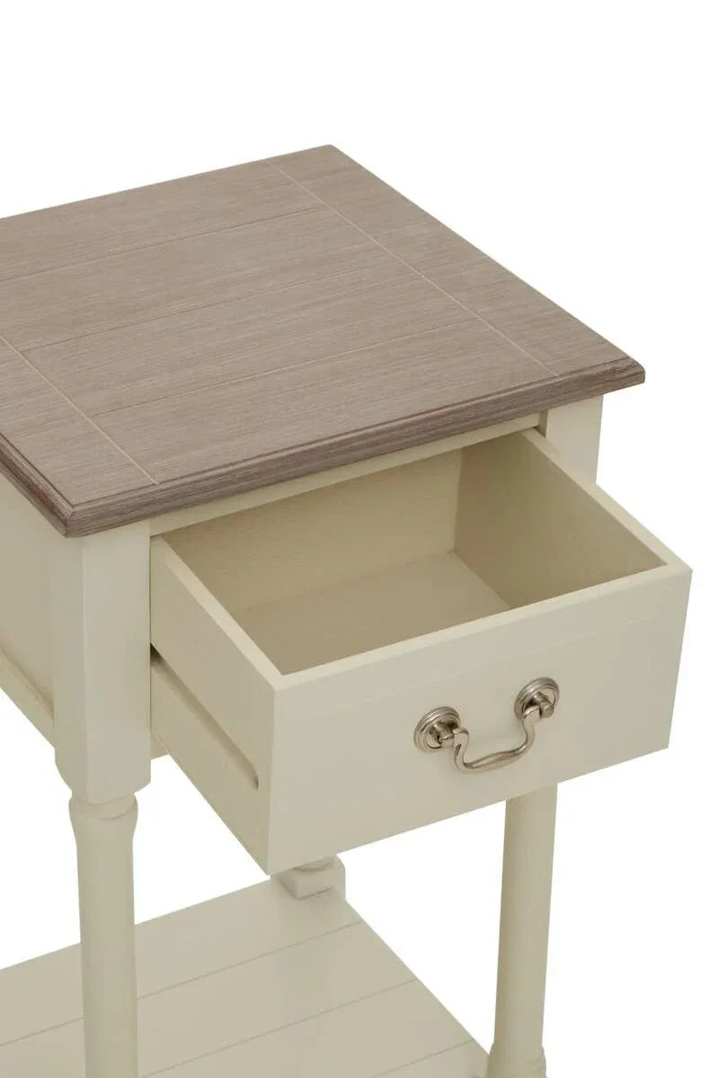 Cream wooden bedside table with drawer open and contrasting oak top