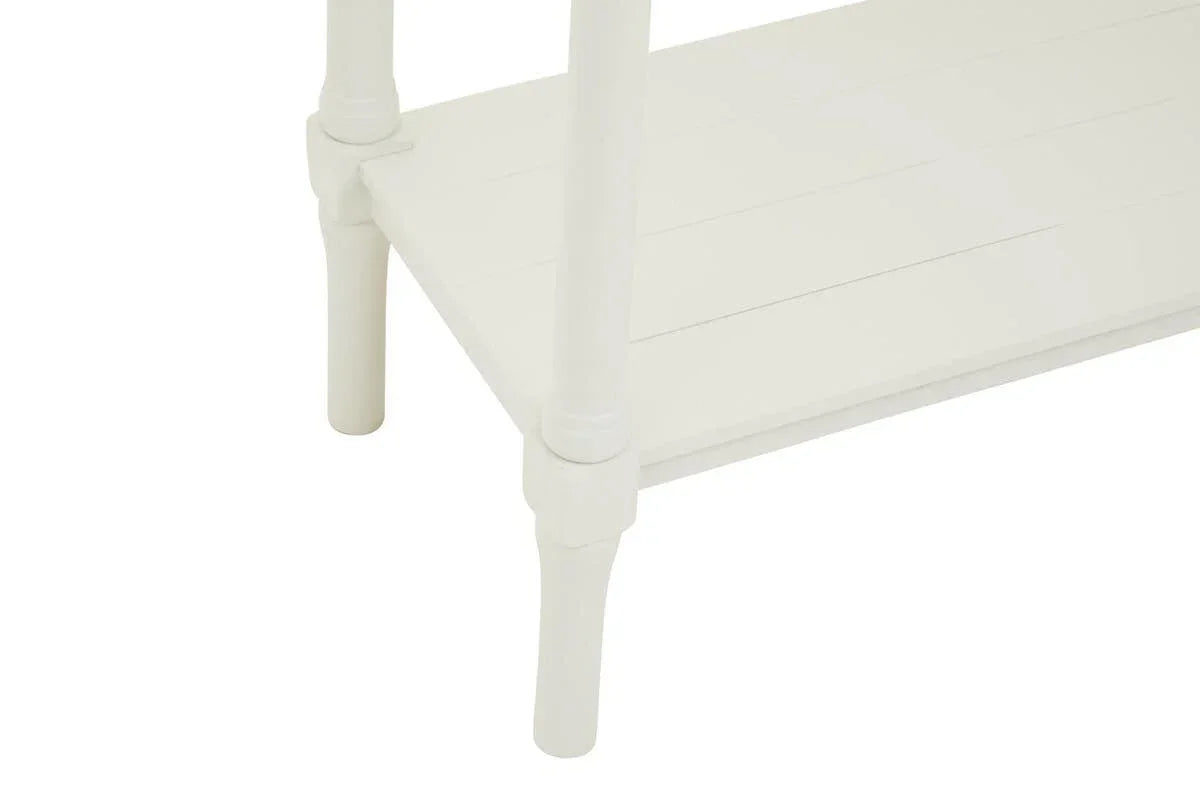 White wooden furniture leg and shelf detail with slatted finish