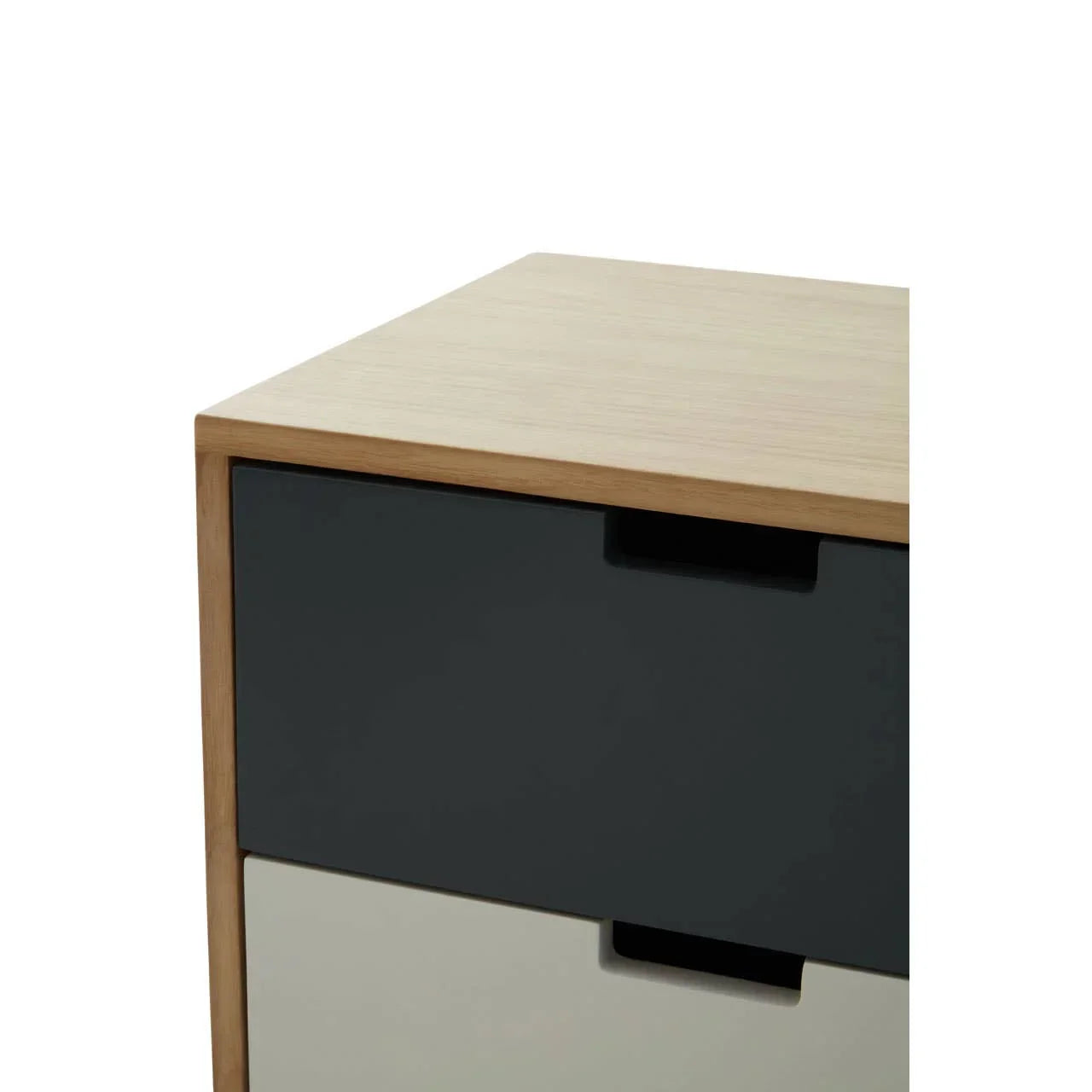 Close-up of modern two-drawer bedside table with black and white fronts and wood top