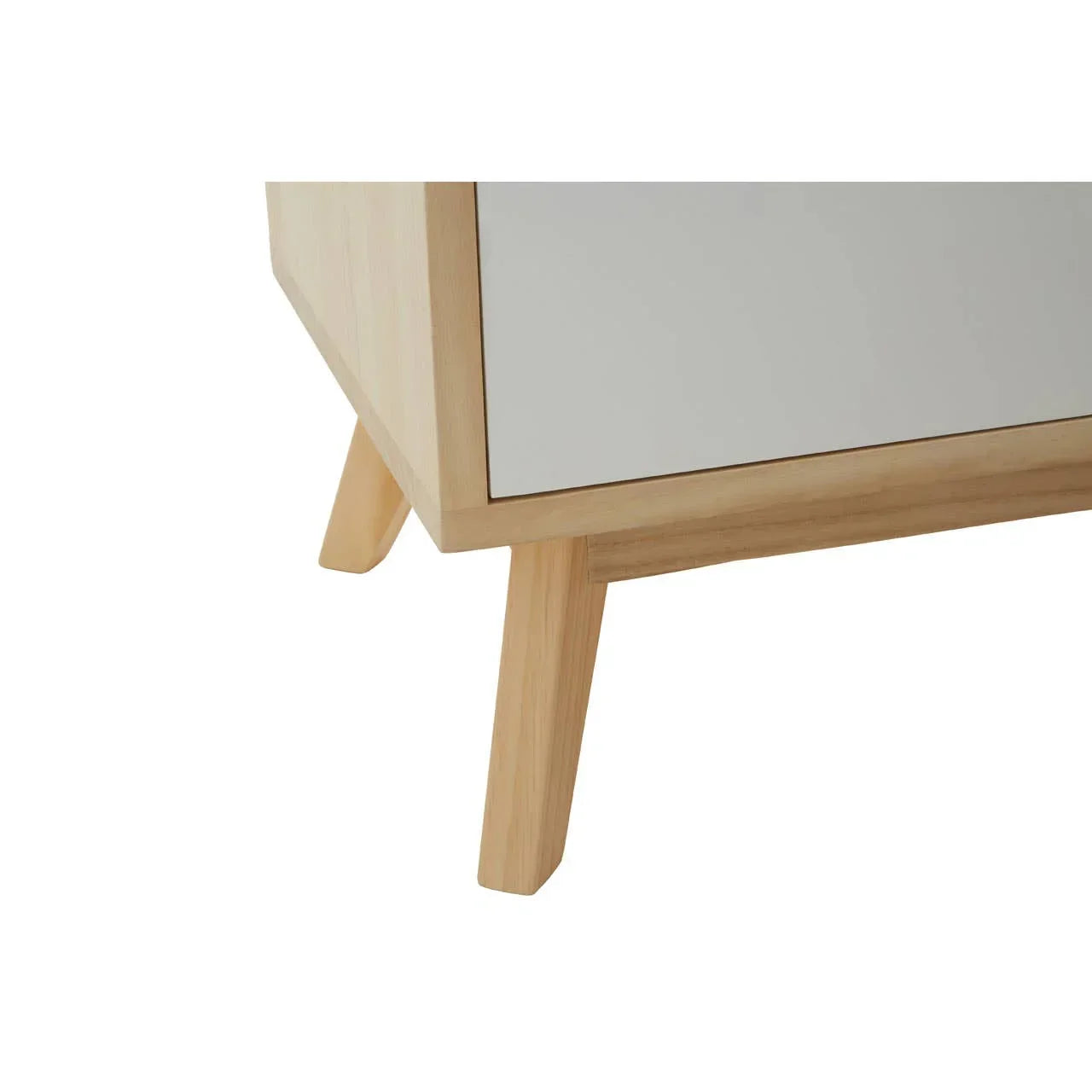 Light wood sideboard corner with angled legs and white panel detail