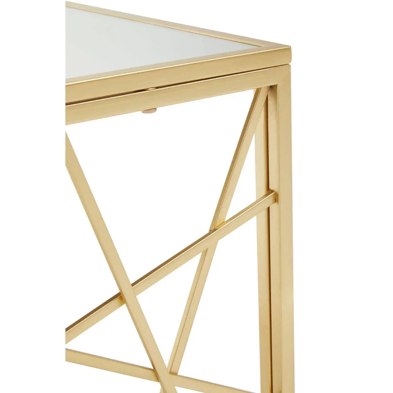 Gold metal side table corner with geometric frame and glass top