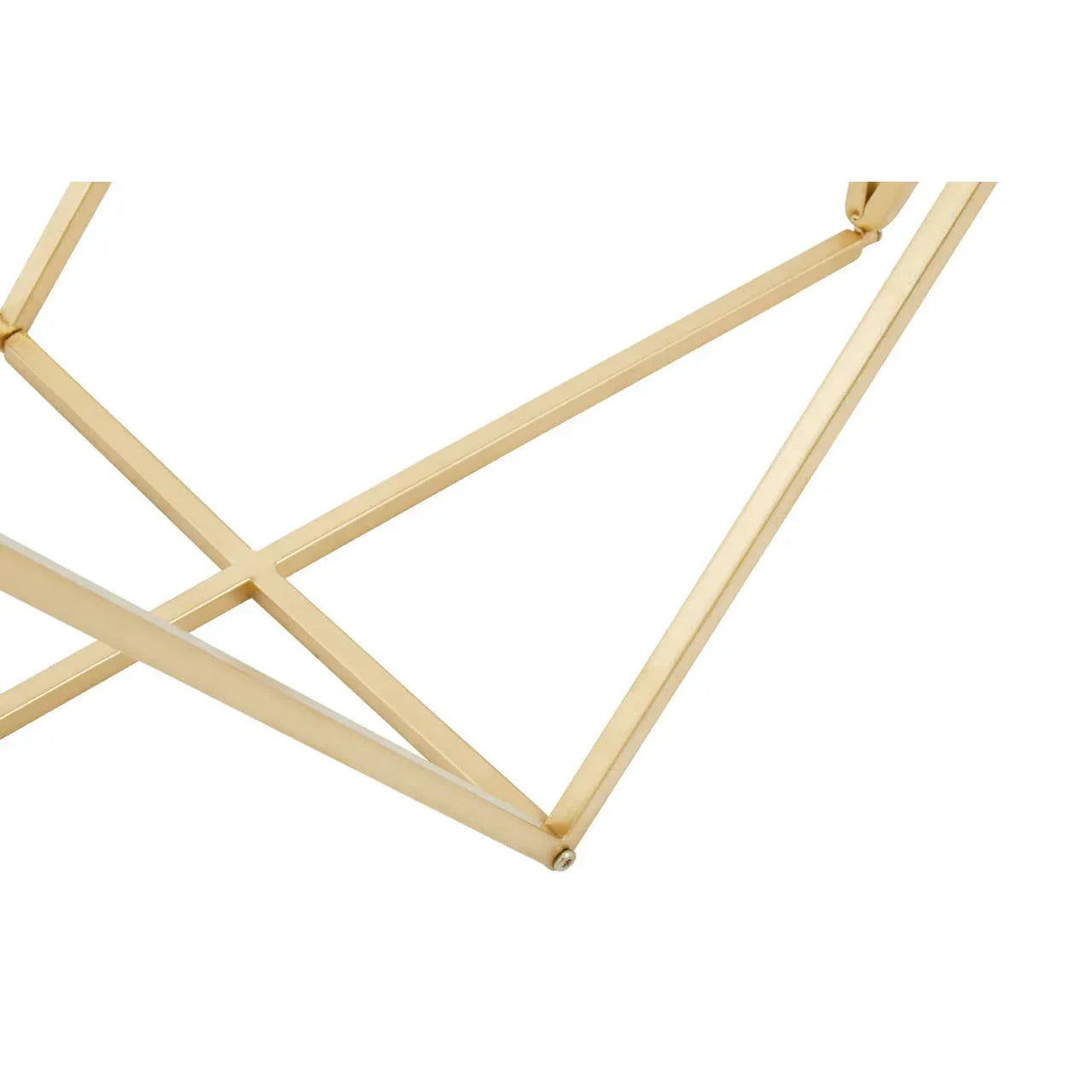 Gold metal table base with intersecting geometric legs, modern furniture detail
