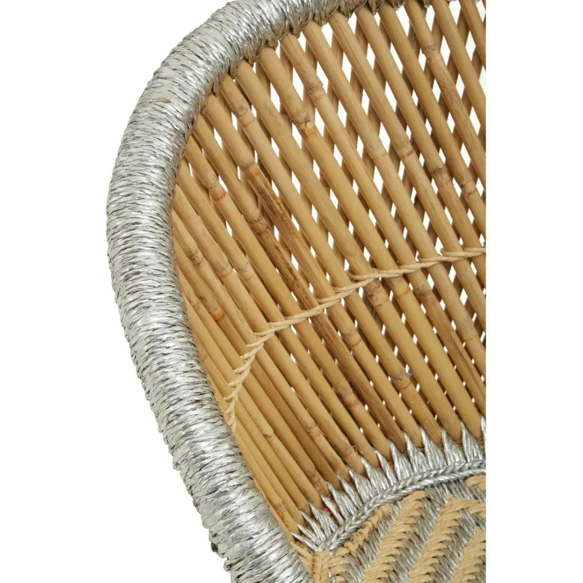 Close-up of rattan chair backrest with silver woven trim detail