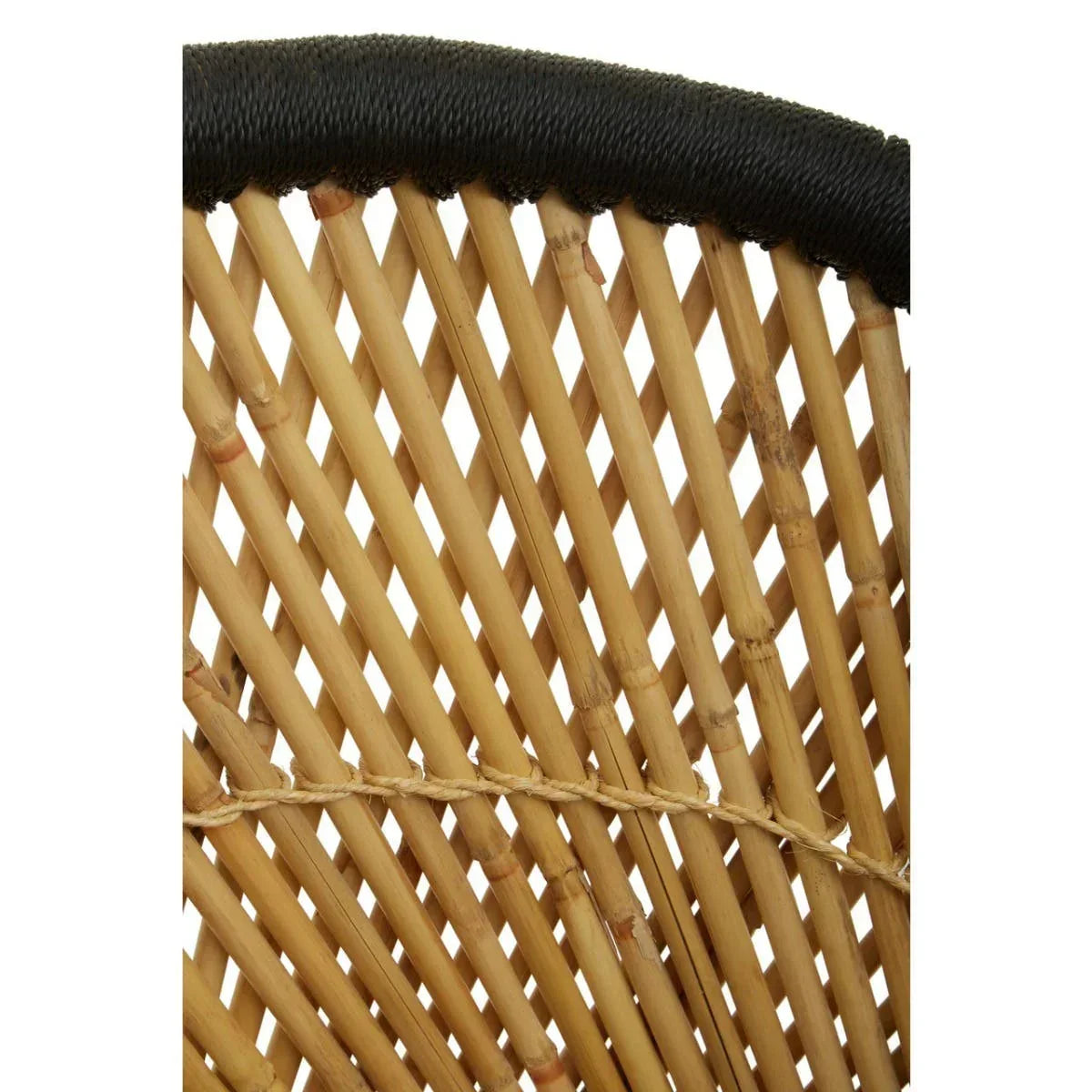 Closeup of rattan furniture backrest with woven bamboo slats and dark top edge